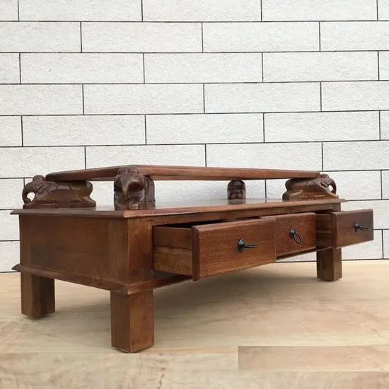 Mango wood rectangular brown Three drawer and carved elephant details on the sides Asgil coffee table.