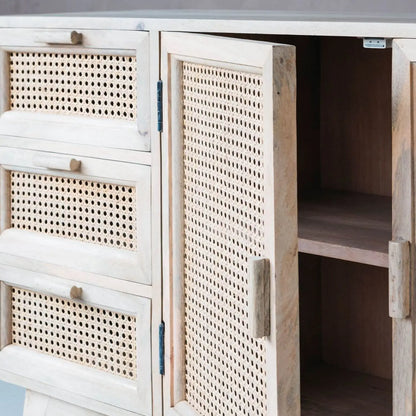 Wooden cabinet with rattan-style doors and drawers