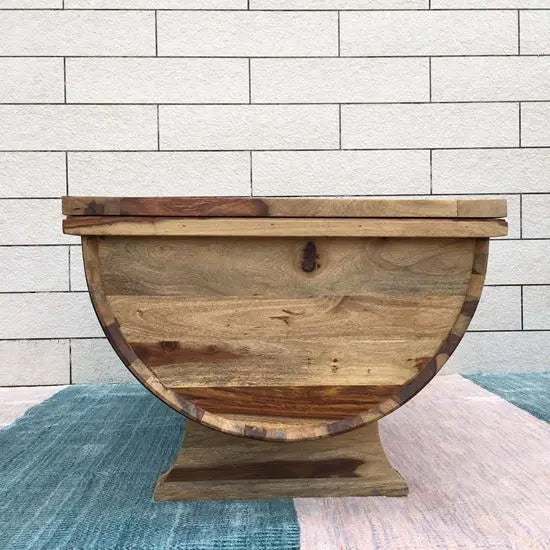 Solid sheesham wood barrel shaped coffee table Walnut with metal strips on the sides.