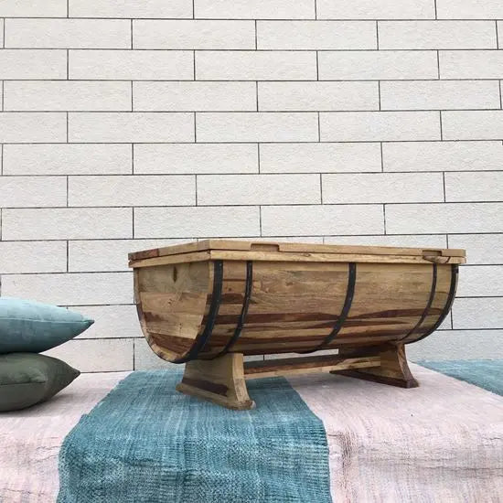 Solid wood barrel shaped coffee table  One top side Upper Door storage with metal strips on the sides.
