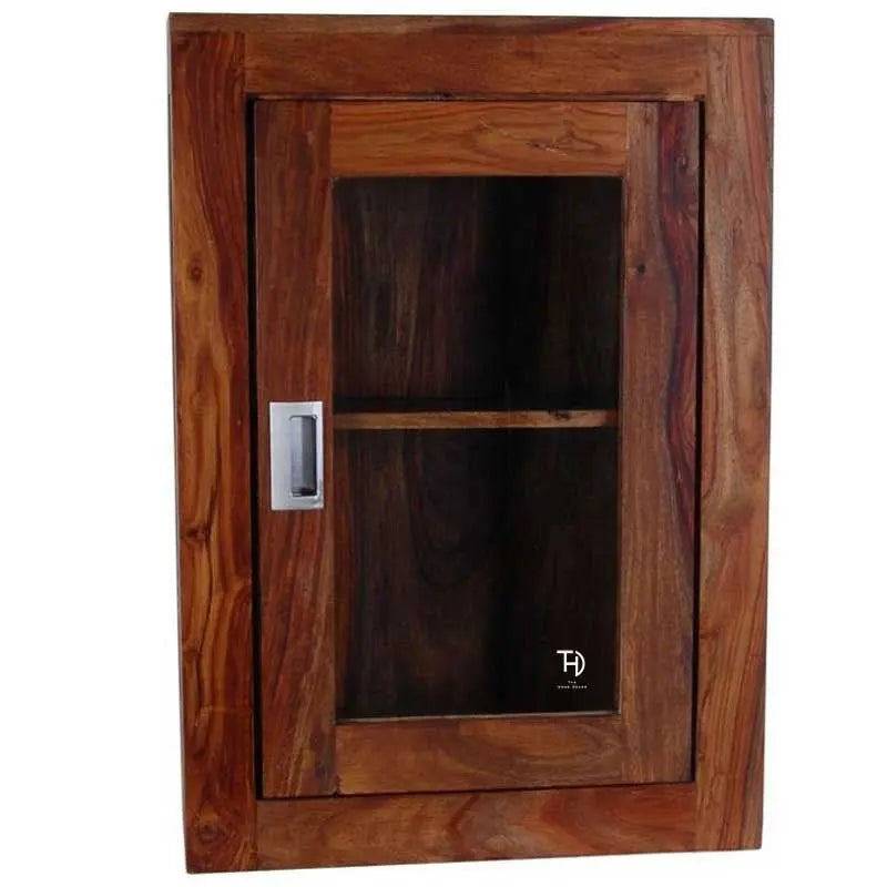 Wooden cabinet with glass door.