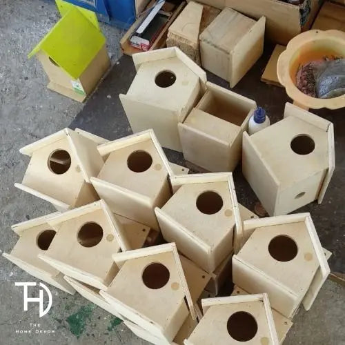 Solid Wood birdhouse with green roof.