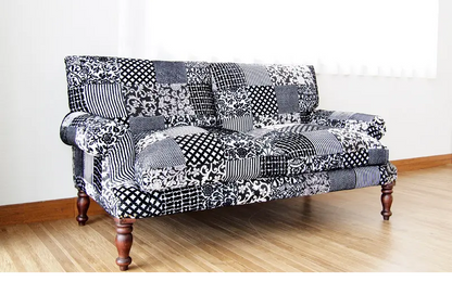 Two seater Pattern Black Sparrow Sofa with four carving legs. 