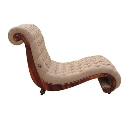 Beige tufted chaise lounge with wooden frame.
