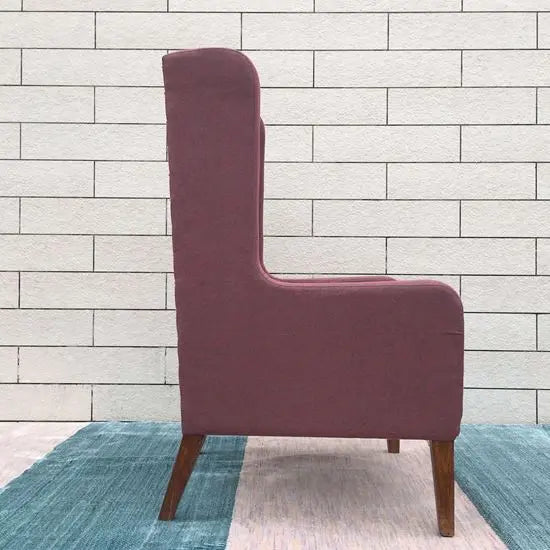 Wing chair made of sheesham wood, & upholstered.