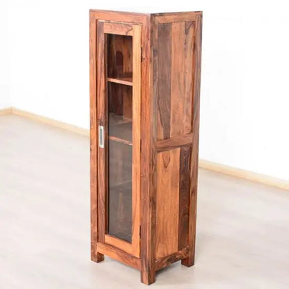 One Glass Door Almi Cabinet Made in Solid Sheesham Wood also Use Mdf on Back Panel and Glass on Door Panel. 