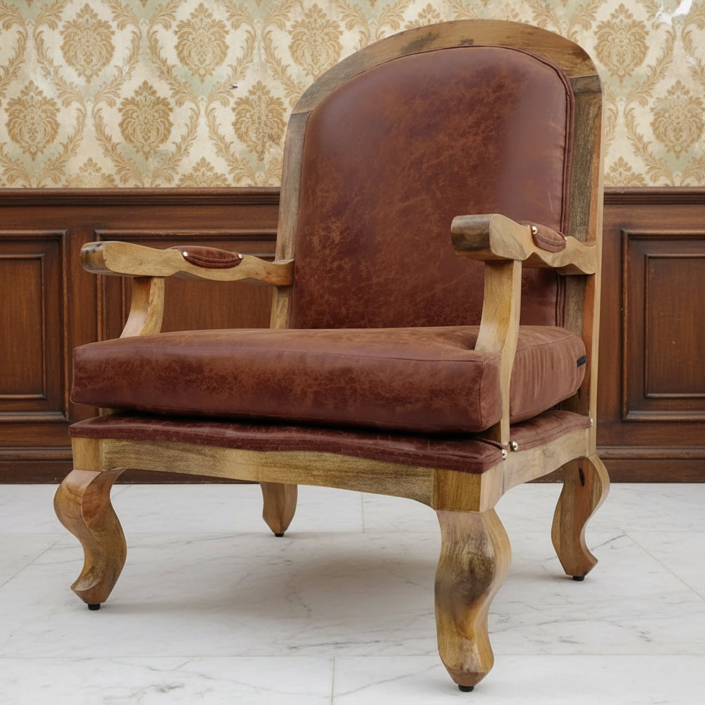 A brown upholstered cushioned chair with curved wooden legs and a tufted backrest.