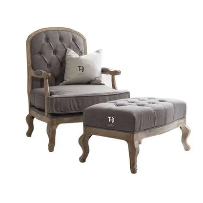Mango wood Charles chair with foot stool in mango natural finish with grey fabric.  