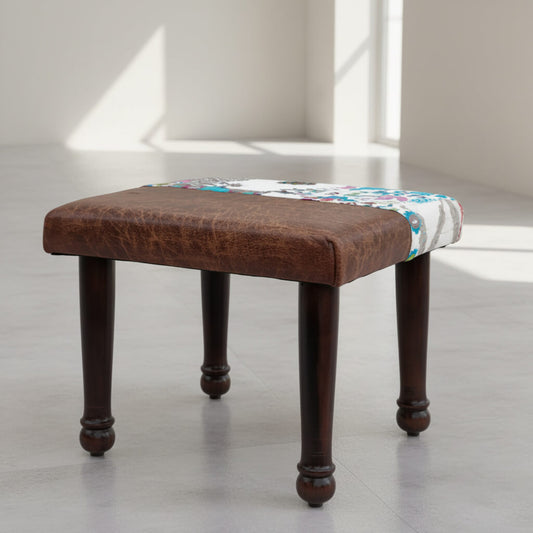 A brown and multicolor patchwork fabric-covered chowk.
