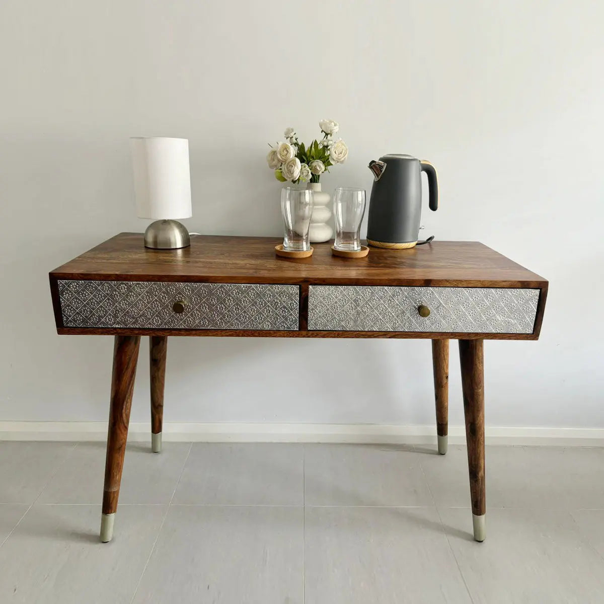 Two drawer with silver color foil sheet on drawer Clazzer study table made in Solid sheesham wood. 
