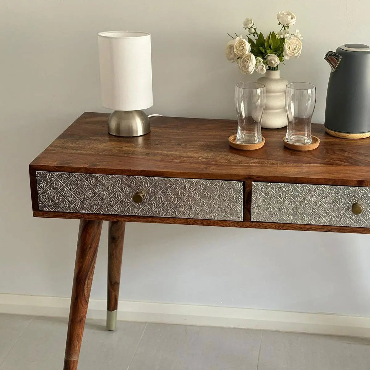 Solid sheesham wood Two drawer with silver color foil sheet on drawer Clazzer study table. 
