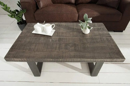 wooden and metal frame rectangle shaped dark jett coffee table.   