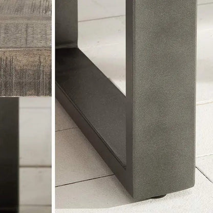Solid wood and metal frame rectangle shaped dark jett coffee table.