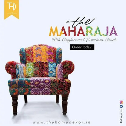 A colorful Desi Banjara fabric upholstered sofa single seater.