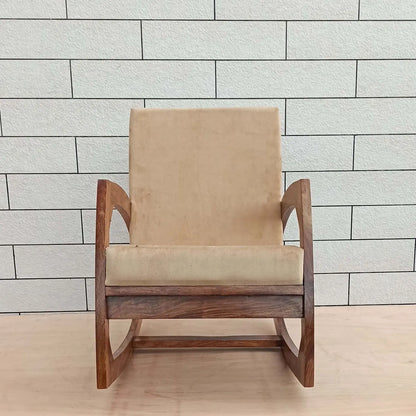 Beige cushioned Designer rocking chair with wooden frame. 