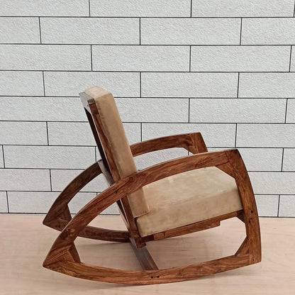 Solid wood designer rocking chair with beige cushion.