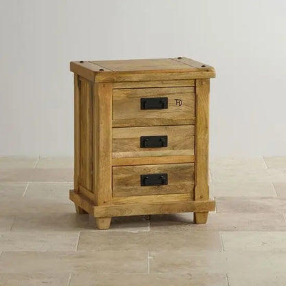 Solid wood three drawer devi bedside table with featuring metal handles.