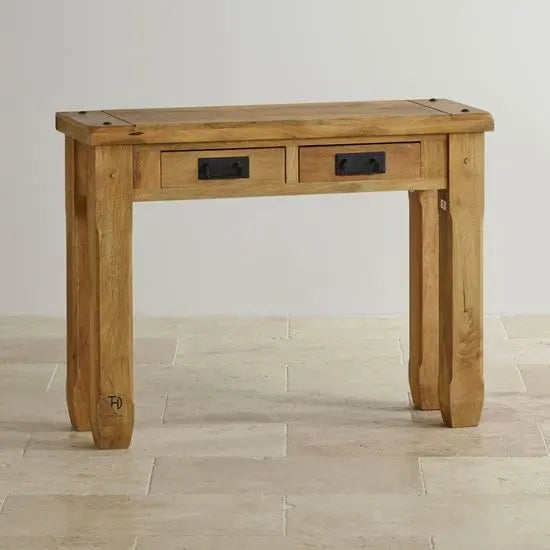 Simple two drawer console table made in mango wood with mango natural finish. 