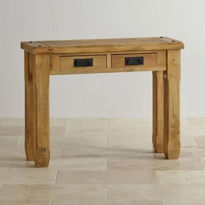Simple two drawer console table made in mango wood with mango natural finish. 