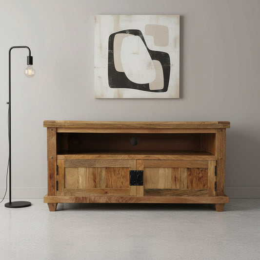 A wooden Devi TV cabinet with an open shelf and a closed compartment with a door, presented in an online product setting against a neutral background.