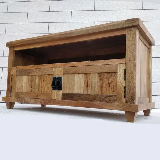 Two flap door and one shelf Devi tv cabinet made in mango wood. 