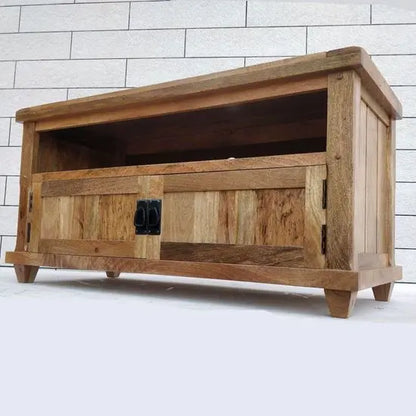 Two flap door and one shelf Devi tv cabinet made in mango wood. 