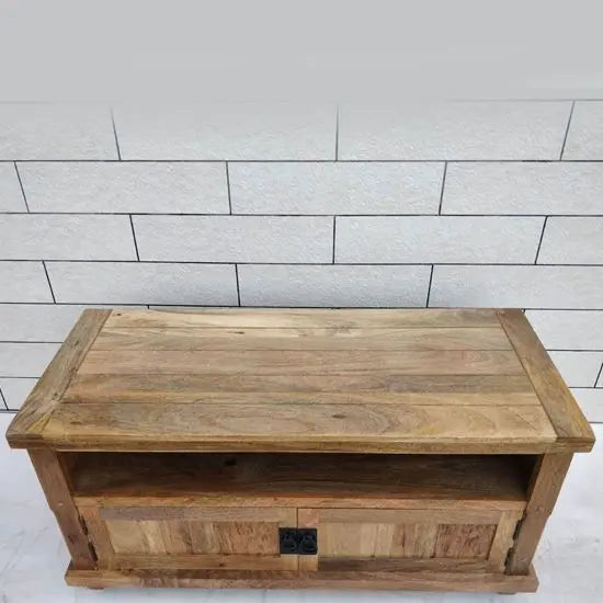 Two flap door and one shelf Devi tv cabinet made in solid mango wood. 