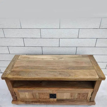 Two flap door and one shelf Devi tv cabinet made in solid mango wood. 