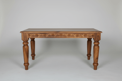 Solid wood Dome four seater dining table with intricate carvings.