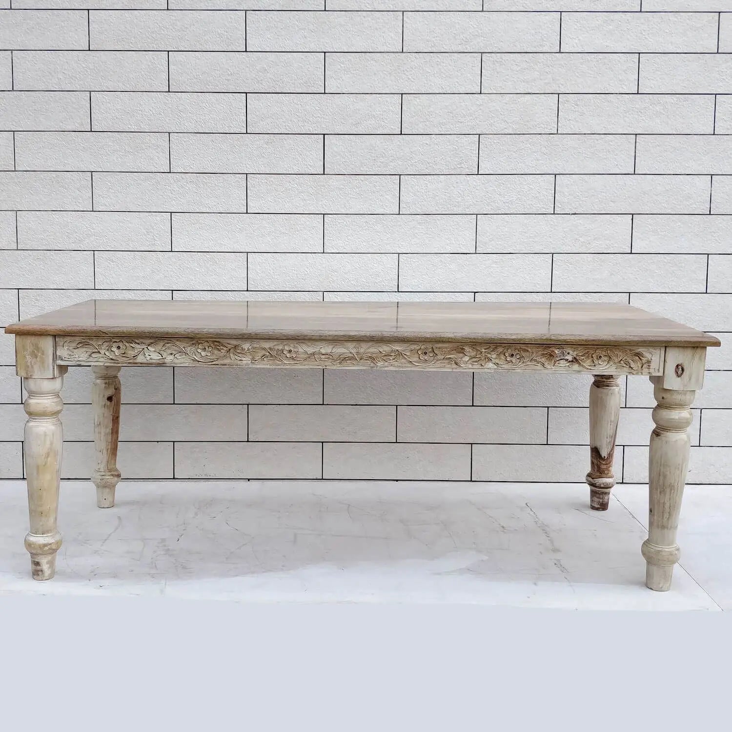 Wooden Rectangle shape Dome eight seater dining table with intricate carvings in antique white finish.