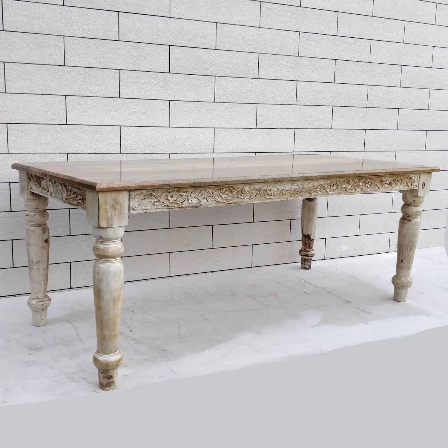 Solid wood Rectangle shape Dome eight seater dining table with intricate carvings in antique white finish.