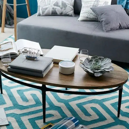 Solid mango wood and hammered iron base Oval shaped Eliptika coffee Table. 