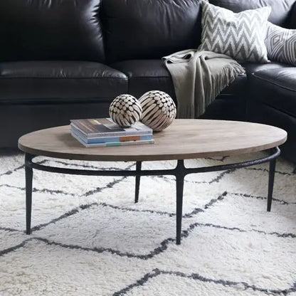 Solid wood and hammered iron base Oval shaped Eliptika coffee Table. 