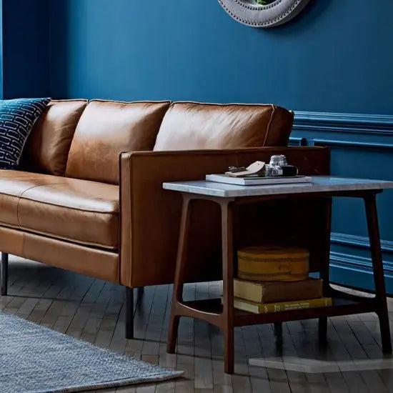 A rectangle sheesham wood End table handmand featuring a marble top. 
