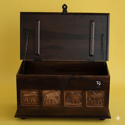 Solid wood Trunk with elephant carvings on Front Panel. 