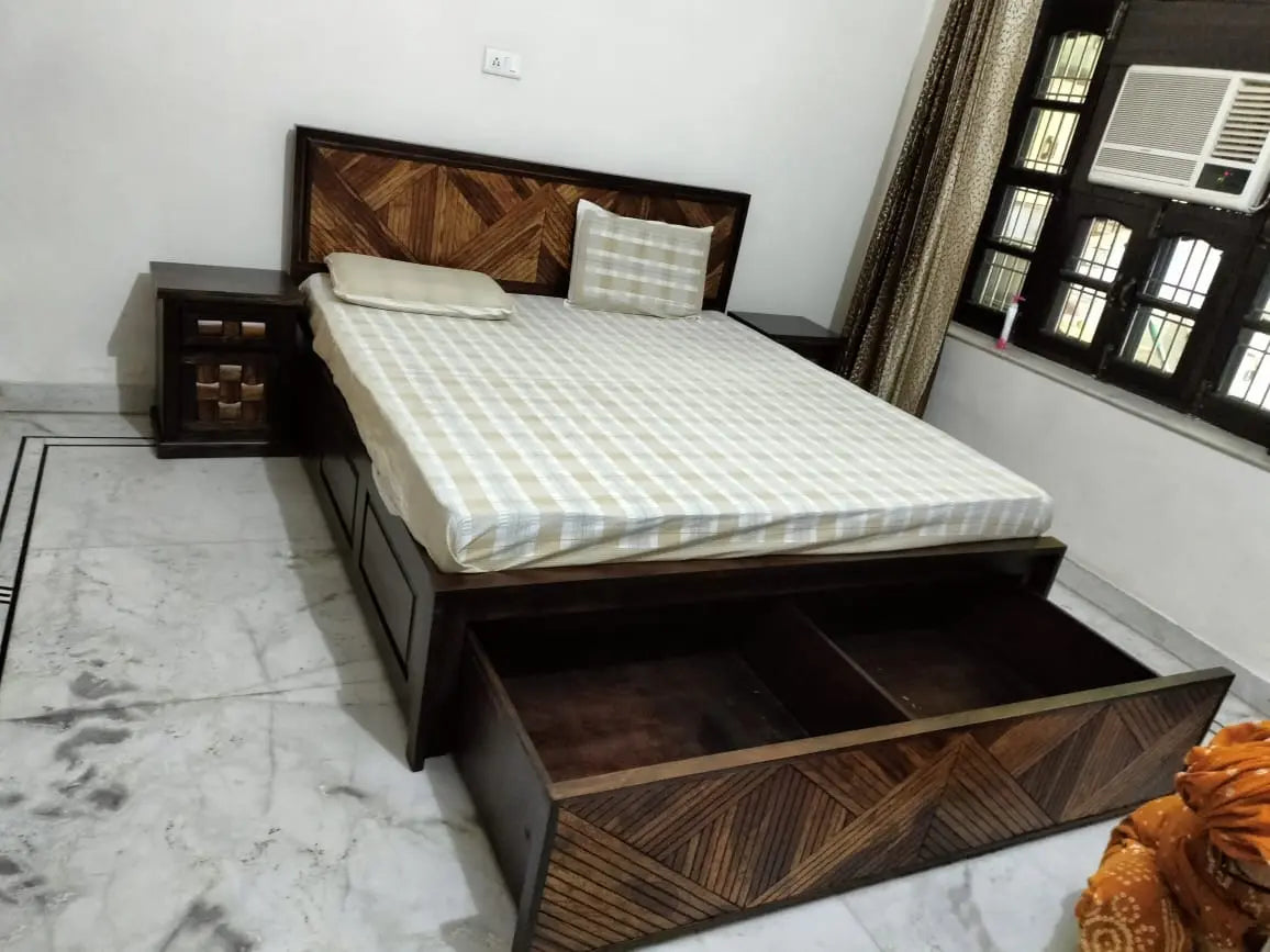 Wooden bed with storage drawers in a bedroom setting. 