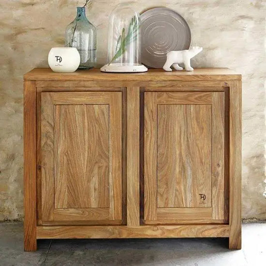 A wooden sideboard with two doors, Made in solid sheesham wood.