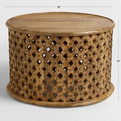 Solid mango wood Round shaped isha center table in hand-carved sides and geometric patterns. 