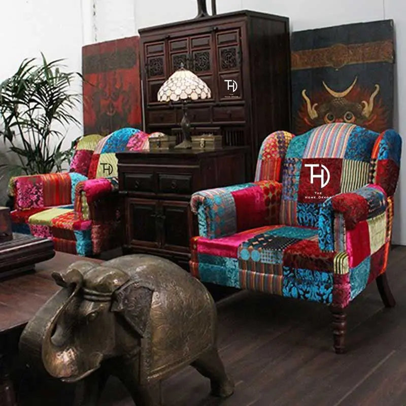 Colorful patchwork armchairs With carved legs in walnut finish.