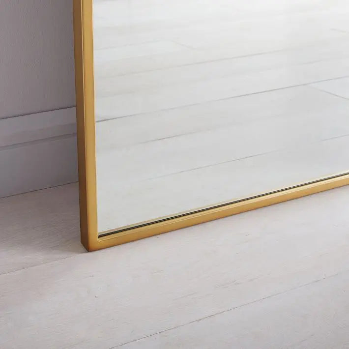 Metal framed arch Kendra golden mirror. 