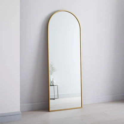 Gold metal framed arch mirror. 