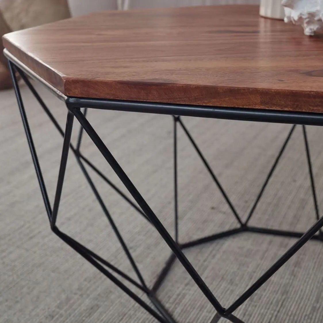 Solid sheesham wood Hexagonal Shape table with geometric black metal base.