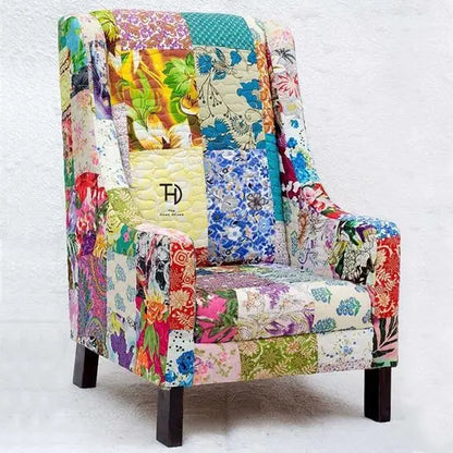 A colorful patchwork fabric covered kids sofa for kids of age 1 to 8 years.