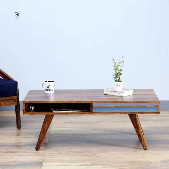 Modern Laatto Coffee Table made of solid Sheesham wood with two gray-colored drawers and shelves. 