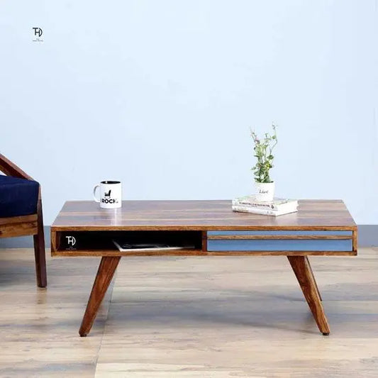 Modern Laatto Coffee Table made of solid Sheesham wood with two gray-colored drawers and shelves. 