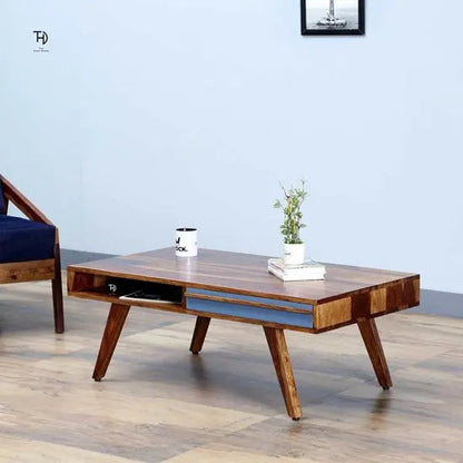 Solid wood Rectangle shape Modern Laatto coffee table with two gray-colored drawers and shelves.