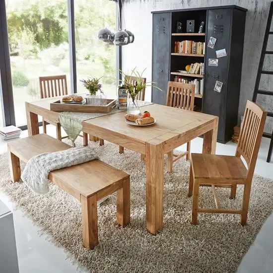 Solid wood dining set comprising a table, bench, and four chairs. 