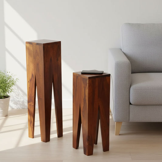 Two wooden end tables with a square top and slim legs, one larger than the other, in a brown finish.