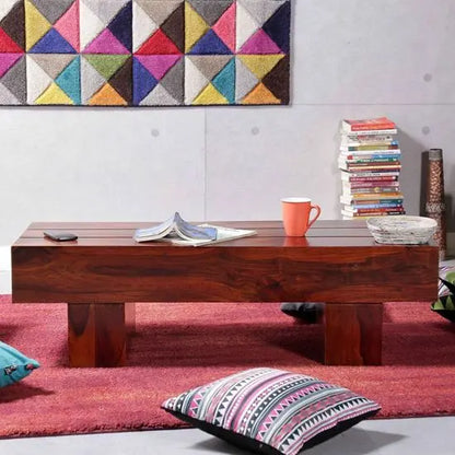 Solid wood rectangle shape logatto coffee table in honey finish.  
