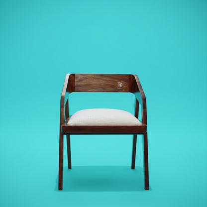 A brown Loria chair with an upholstered seat, made from solid Sheesham wood.